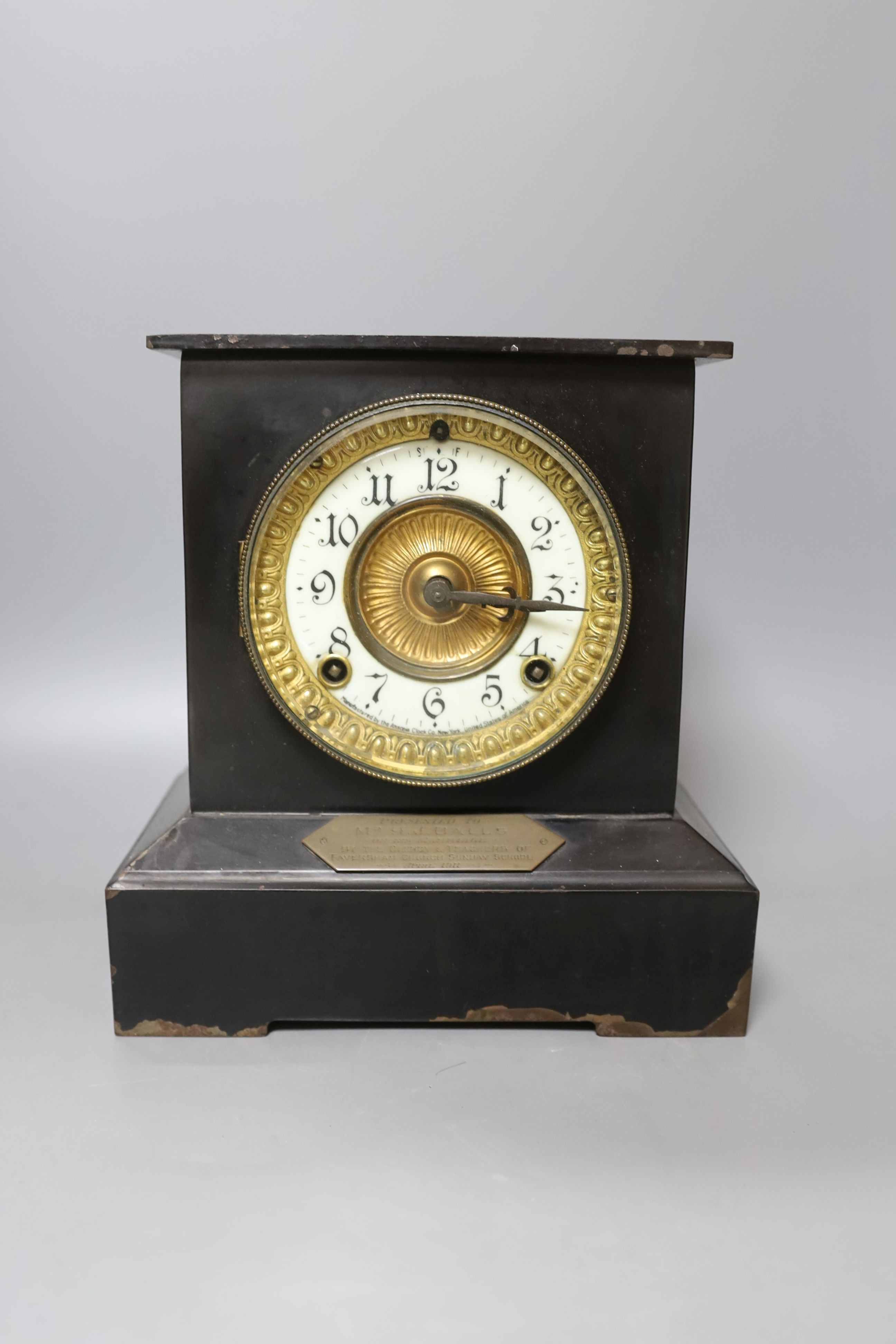 An Ansonia, New York, marriage mantel clock presented to ‘Mr H. J Halls’ dated 1911- 24cm tall
